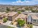 Community aerial view featuring houses, landscaping, and nearby mountain views at 5528 Stone Lagoon St, North Las Vegas, NV 89031