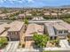 Neighborhood aerial view featuring houses, landscaping, and nearby mountain views at 5528 Stone Lagoon St, North Las Vegas, NV 89031