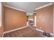 Bedroom showing carpet and base molding with a view into another room at 5528 Stone Lagoon St, North Las Vegas, NV 89031