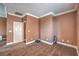 Empty bedroom featuring carpeted flooring and crown molding at 5528 Stone Lagoon St, North Las Vegas, NV 89031