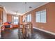 Bright dining area with a pendant light fixture and backyard views at 5528 Stone Lagoon St, North Las Vegas, NV 89031