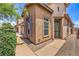 Attractive home exterior highlighting the neutral stucco, well-maintained landscaping, and inviting front entrance at 5528 Stone Lagoon St, North Las Vegas, NV 89031