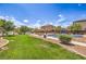Neighborhood park offering a relaxing green space, sidewalks and play area for the whole Gathering at 5528 Stone Lagoon St, North Las Vegas, NV 89031
