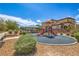Community playground featuring slides and a covered picnic area, perfect for families at 5528 Stone Lagoon St, North Las Vegas, NV 89031