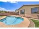 Private pool area with easy access, complemented by a landscaped backyard at 5528 Stone Lagoon St, North Las Vegas, NV 89031