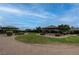 Community green space with picnic pavilions, grassy area, and walkways at 573 Sellers Pl, Henderson, NV 89011