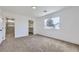 Large bedroom with carpet, neutral walls, and ensuite bath and walk-in closet at 5834 Autumn Harvest Ave, Las Vegas, NV 89142