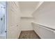 Walk-in closet with carpeted flooring and built-in shelving for optimal organization at 5834 Autumn Harvest Ave, Las Vegas, NV 89142