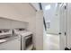 Convenient laundry room featuring modern appliances, shelving, and bright, airy space at 5834 Autumn Harvest Ave, Las Vegas, NV 89142