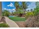 Spacious backyard features a sparkling pool and a well-maintained lawn, perfect for outdoor enjoyment and relaxation at 5992 Quintillion Ave, Las Vegas, NV 89122