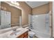 Neutral bathroom featuring a large mirror, tub, and white subway tile at 5992 Quintillion Ave, Las Vegas, NV 89122