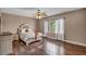 Bedroom with a ceiling fan, hardwood floors, and furniture set at 5992 Quintillion Ave, Las Vegas, NV 89122