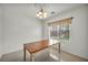 Bright dining room with chandelier and window overlooking the backyard at 5992 Quintillion Ave, Las Vegas, NV 89122