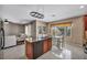 Charming eat-in kitchen with granite counters and stainless steel dishwasher at 5992 Quintillion Ave, Las Vegas, NV 89122