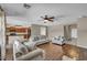 Open living room with wood floors connecting to kitchen at 5992 Quintillion Ave, Las Vegas, NV 89122