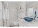 Neutral bathroom with shower and bath, white sink basin and granite countertop at 6140 Galileo Dr, Las Vegas, NV 89149