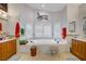 Bright bathroom with a soaking tub, dual sinks, and ample natural light at 6140 Galileo Dr, Las Vegas, NV 89149