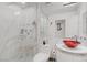 Modern bathroom with glass walk-in shower, red bowl sink, and neutral tones at 6140 Galileo Dr, Las Vegas, NV 89149