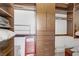 Walk-in closet offering generous storage with custom shelving and drawers at 6140 Galileo Dr, Las Vegas, NV 89149