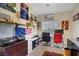 Organized home office space with neutral carpet and bright light at 6140 Galileo Dr, Las Vegas, NV 89149