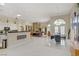 Bright open floorplan with a kitchen, living room, and dining area at 6140 Galileo Dr, Las Vegas, NV 89149