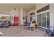 Covered patio offering an outdoor dining area with durable brick pavers at 6140 Galileo Dr, Las Vegas, NV 89149