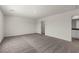 Neutral bedroom featuring carpet floors, white walls, and a bright window at 6185 Blood Lily Ave, Las Vegas, NV 89122