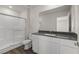 Contemporary bathroom featuring a glass shower, modern vanity, and vinyl floors at 6197 Blood Lily Ave, Las Vegas, NV 89122