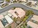 Aerial view showing the backyard with decorative elements and roof details at 6405 Break Point Ave, Las Vegas, NV 89130