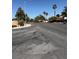 Street view of a quiet residential neighborhood with mature trees and well-maintained sidewalks at 6766 Sebring St, Las Vegas, NV 89103