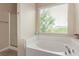 This bathroom features a soaking tub and a separate shower stall at 6788 Sharks Bay Ct, Las Vegas, NV 89149