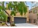 Charming two-story home with a large two car garage and manicured landscaping at 6788 Sharks Bay Ct, Las Vegas, NV 89149