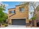 Charming two-story home with a large two car garage and manicured landscaping at 6788 Sharks Bay Ct, Las Vegas, NV 89149