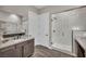 Well-designed bathroom with a glass shower, dual sinks, and modern finishes at 6865 Steel Mist St, Las Vegas, NV 89148