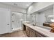 Elegant bathroom with a large glass-enclosed shower, dual sink vanity, and modern fixtures at 6865 Steel Mist St, Las Vegas, NV 89148