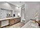 Bathroom showcasing marble counters, decorative fixtures, and gray cabinets at 6865 Steel Mist St, Las Vegas, NV 89148
