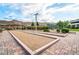 Outdoor bocce ball court featuring mountain views in the background at 6865 Steel Mist St, Las Vegas, NV 89148