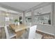 Stylish dining room with open view to living and kitchen areas at 6865 Steel Mist St, Las Vegas, NV 89148