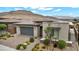 Beautiful single-story residence with mountain views and an attractive exterior featuring landscaping at 6865 Steel Mist St, Las Vegas, NV 89148