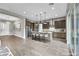 Modern kitchen with stainless steel appliances, center island, and pendant lighting at 6865 Steel Mist St, Las Vegas, NV 89148
