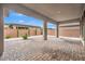 Spacious covered patio with brick pavers, offering an ideal outdoor living space at 6865 Steel Mist St, Las Vegas, NV 89148