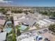 An aerial view of the house shows a pool in the backyard and surrounding houses at 7062 Maverick St, Las Vegas, NV 89131