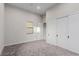 Bedroom features neutral walls, carpet, a window, and a large closet with sliding doors at 7062 Maverick St, Las Vegas, NV 89131