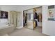 Spacious bathroom with a glass-enclosed shower, soaking tub, and mirrored closet doors, creating a spa-like atmosphere at 7621 Hackensack Ct, Las Vegas, NV 89128