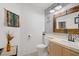Stylish powder room with modern fixtures and eye-catching wallpaper at 7621 Hackensack Ct, Las Vegas, NV 89128