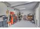 Garage features tool storage, well lit work space and plenty of room for a workbench at 7621 Hackensack Ct, Las Vegas, NV 89128
