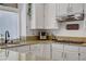 Bright kitchen featuring granite countertops, a gas range, and stainless steel appliances at 7621 Hackensack Ct, Las Vegas, NV 89128