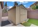 Backyard shows a convenient storage shed with room for tools and equipment at 7621 Hackensack Ct, Las Vegas, NV 89128