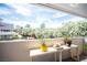 Bright balcony featuring city views, potted plants, and ample sunshine for a delightful outdoor experience at 794 Oakmont Ave # 106, Las Vegas, NV 89109