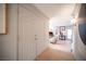 Hallway with closet that leads to the living area with stylish decor at 794 Oakmont Ave # 106, Las Vegas, NV 89109
